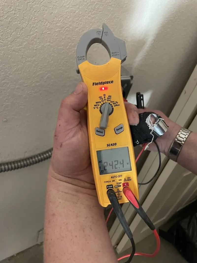 Voltage testing with clamp meter during Aluminum Wiring Replacement in Lindon
